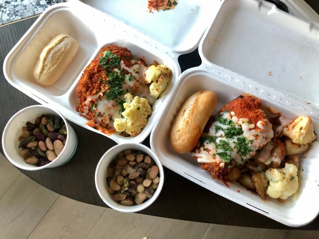 Documenting daily quarantine food. Packed lunch delivered to hotel room to prevent spread of virus.