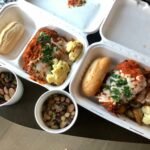 Documenting daily quarantine food. Packed lunch delivered to hotel room to prevent spread of virus.